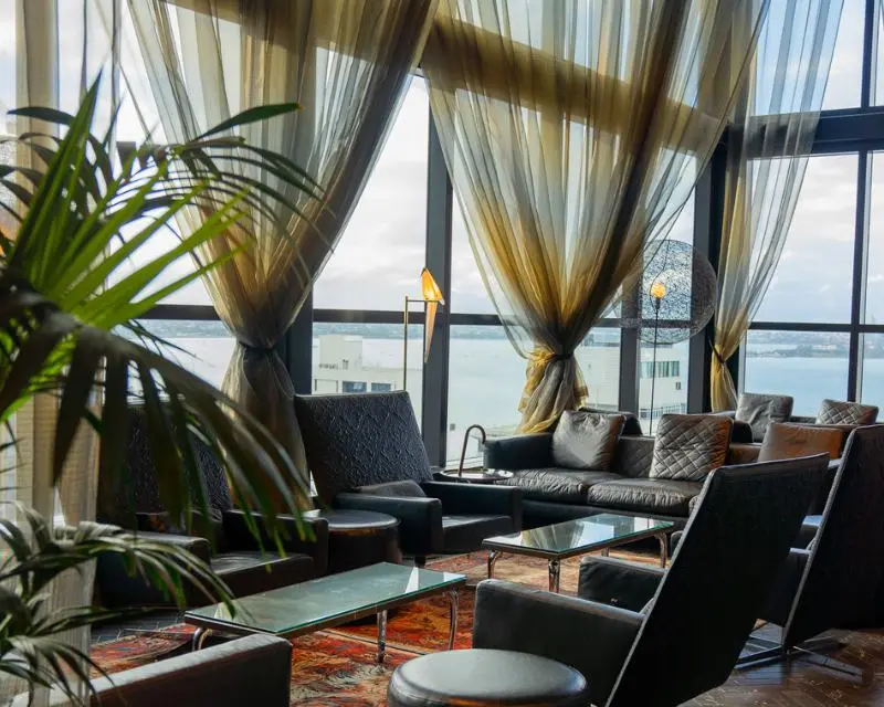 http://Cosy%20public%20space%20with%20large%20armchairs%20and%20large%20windows%20overlooking%20the%20harbour